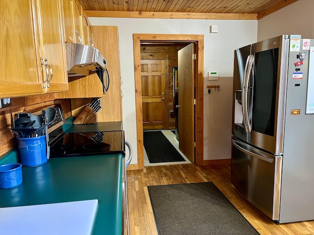 kitchen featuring stainless steel appliances, extractor fan, light hardwood / wood-style flooring, and wooden ceiling