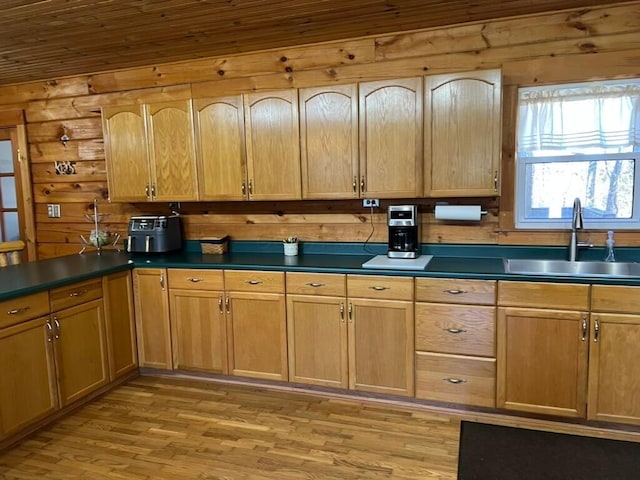 kitchen featuring light hardwood / wood-style floors and sink