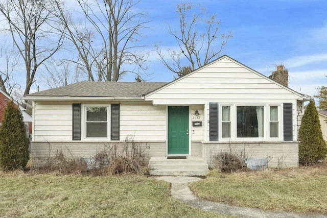 view of front of home with a front yard