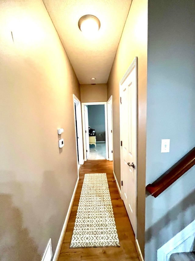 hall featuring dark hardwood / wood-style flooring