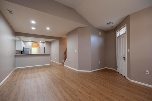 1240 Paddock Loop, Washington Court House, OH 43160 - entryway featuring light wood finished floors, baseboards, stairs, and recessed lighting