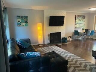 living room with wood-type flooring