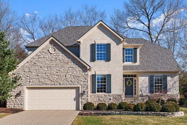 view of front of property featuring a garage