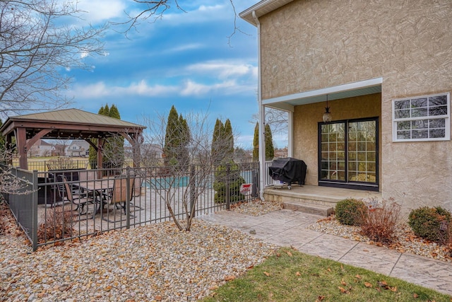 view of yard with a gazebo and a patio