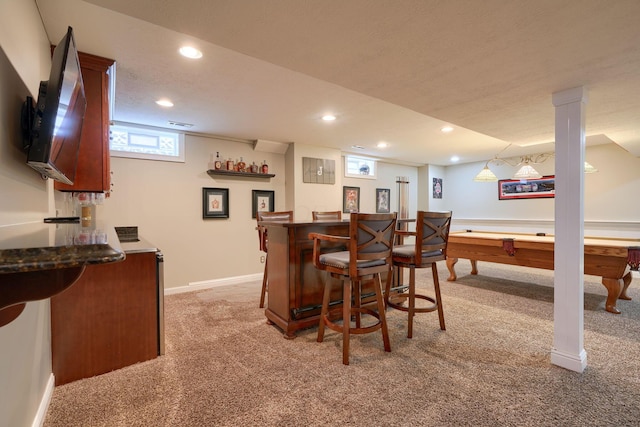 bar with light colored carpet, billiards, and hanging light fixtures