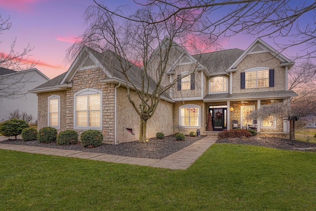 view of front of house featuring a yard