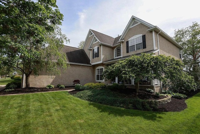 exterior space with a front lawn