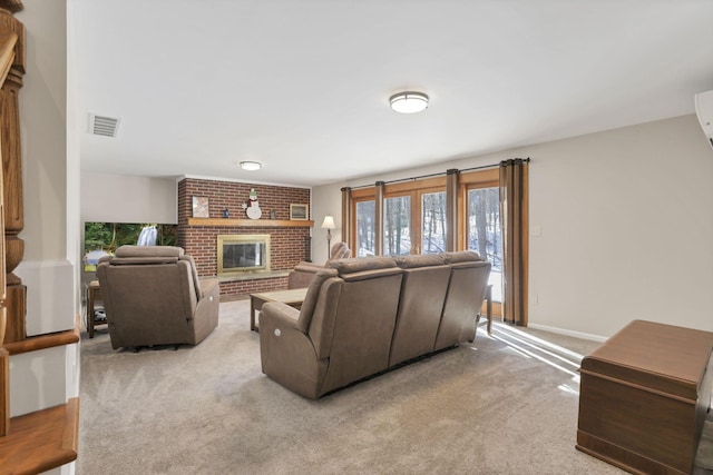 living room featuring a brick fireplace and light colored carpet