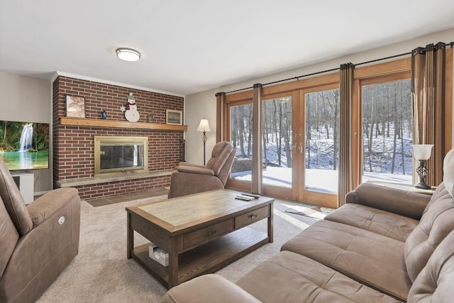 carpeted living room featuring a brick fireplace