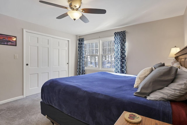 bedroom featuring a closet, ceiling fan, and carpet flooring