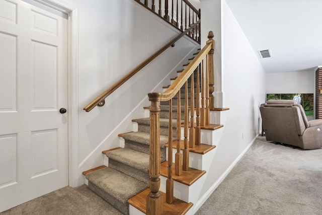 stairs with carpet floors