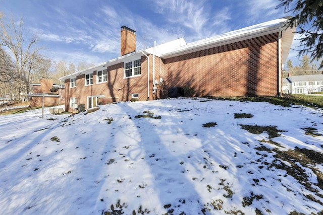 view of snow covered property