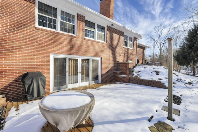 view of snow covered property