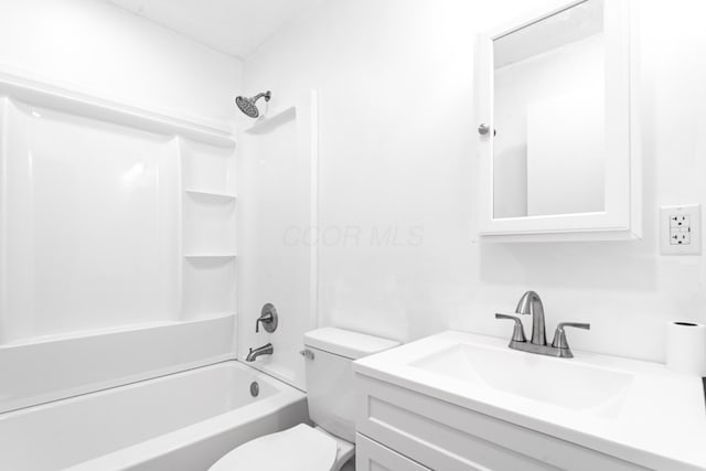 full bathroom featuring shower / bathtub combination, vanity, and toilet