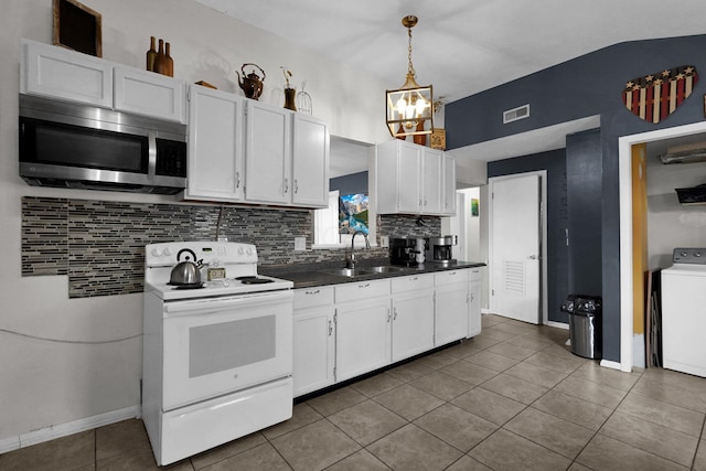 kitchen with white electric stove, washer / dryer, sink, and white cabinets