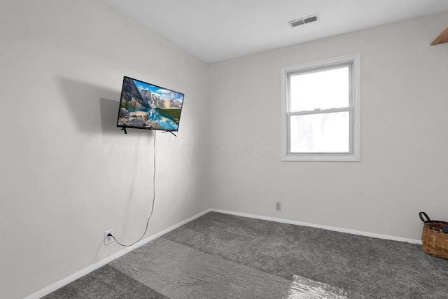 view of carpeted spare room