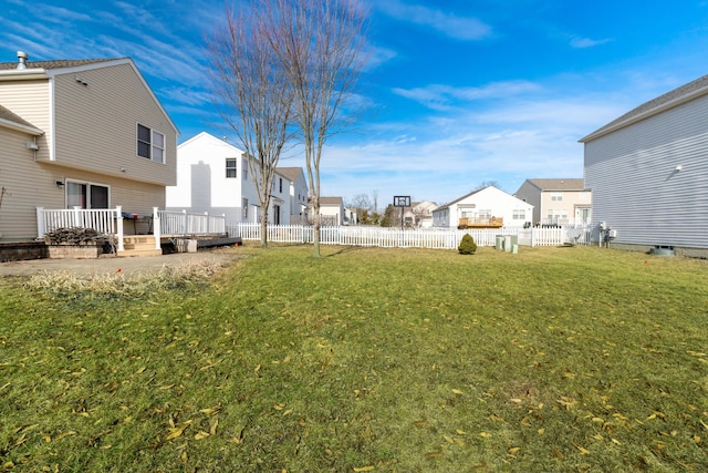 view of yard featuring a deck