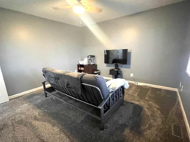 bedroom with ceiling fan and carpet floors