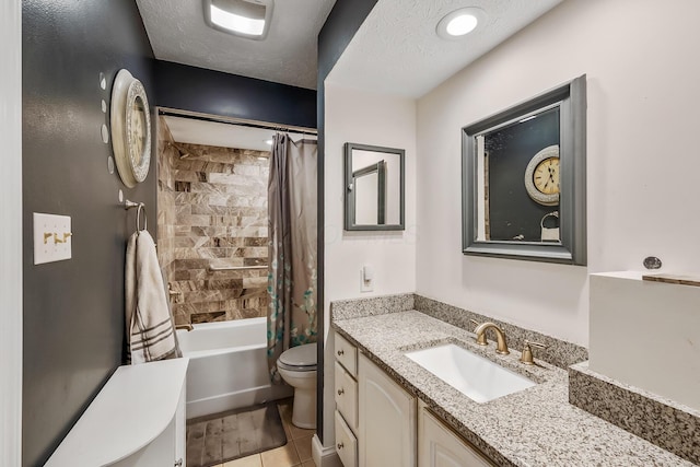 full bath featuring a textured ceiling, toilet, shower / tub combo, vanity, and tile patterned floors