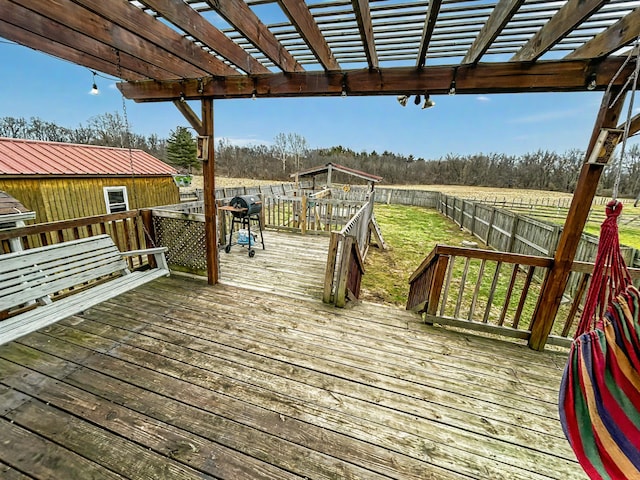 deck featuring grilling area and a pergola