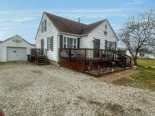 view of front of house with an outbuilding and a garage