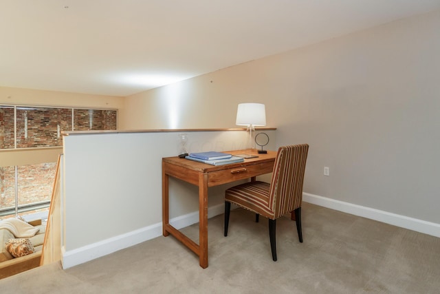 office area with light colored carpet