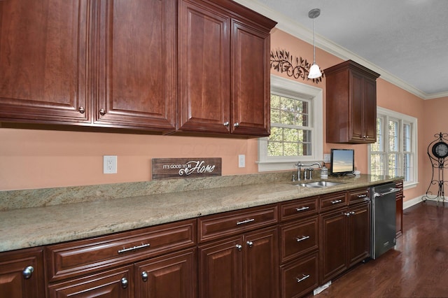 kitchen with pendant lighting, sink, crown molding, dishwasher, and light stone counters