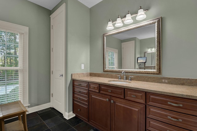 bathroom featuring vanity and tile patterned flooring