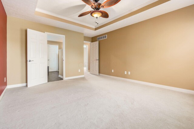7873 Tullymore Dr, Dublin, OH 43016 - unfurnished bedroom with a raised ceiling, ornamental molding, carpet flooring, and ceiling fan