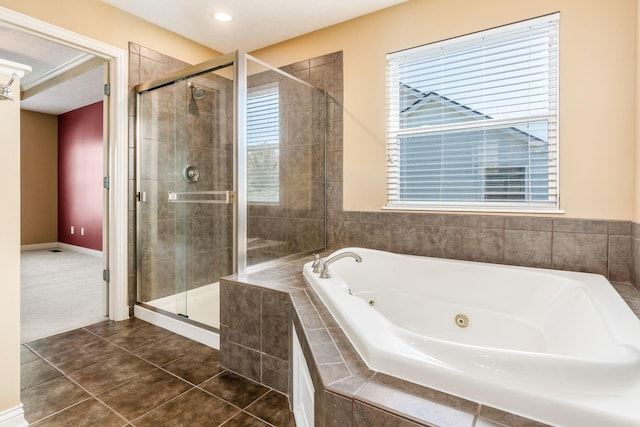 7873 Tullymore Dr, Dublin, OH 43016 - bathroom with tile patterned floors and separate shower and tub