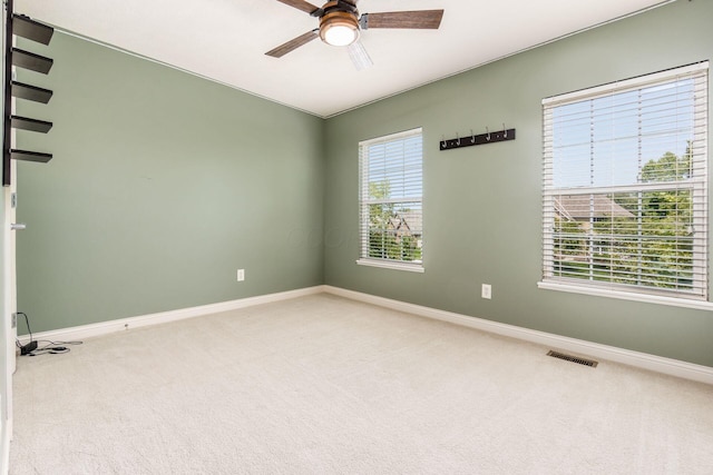 7873 Tullymore Dr, Dublin, OH 43016 - carpeted empty room with plenty of natural light and ceiling fan