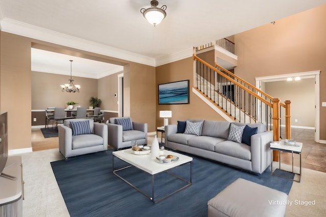7873 Tullymore Dr, Dublin, OH 43016 - living room with crown molding and a chandelier