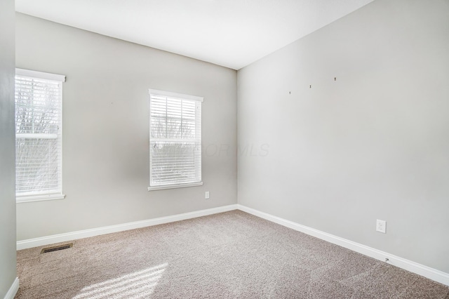 view of carpeted spare room