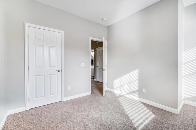 unfurnished bedroom featuring carpet floors