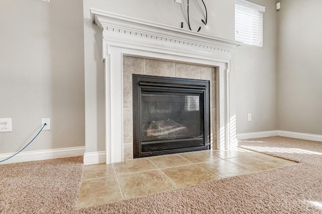 details featuring carpet floors and a tile fireplace