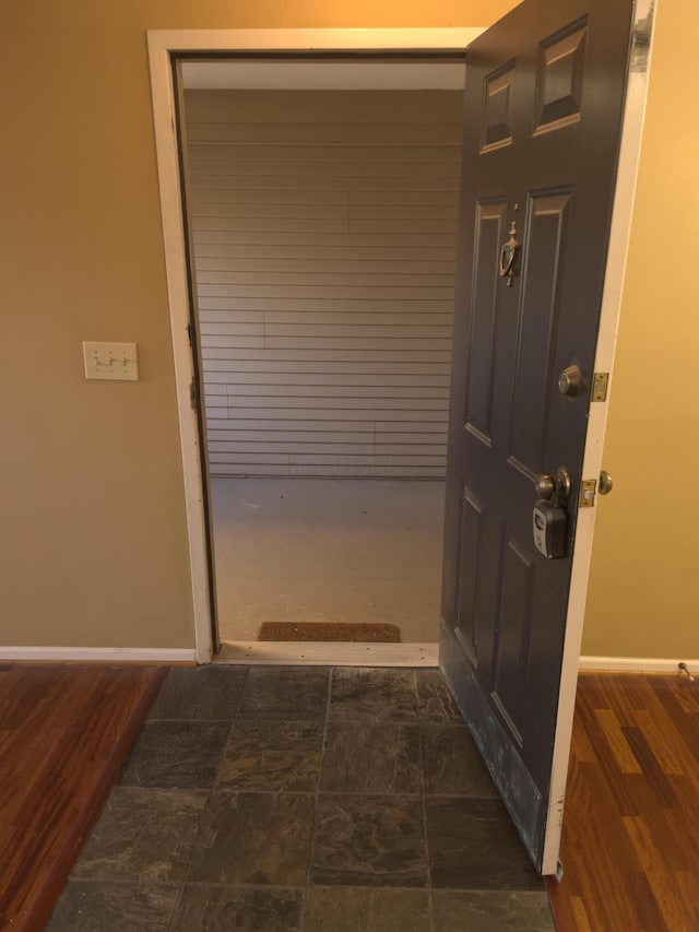 doorway featuring dark hardwood / wood-style flooring