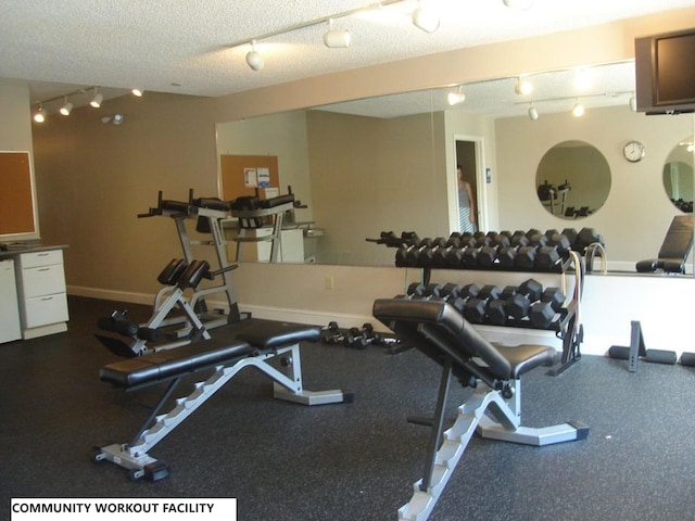 gym with a textured ceiling