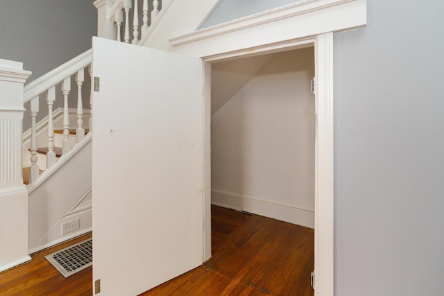 interior space with dark hardwood / wood-style floors