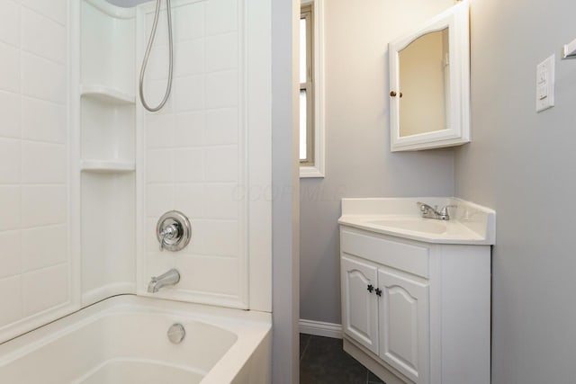 bathroom featuring shower / bathing tub combination, vanity, and tile patterned floors