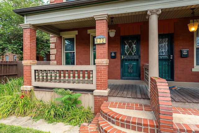 entrance to property with a porch