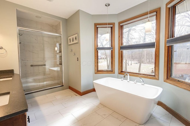 bathroom with vanity and independent shower and bath