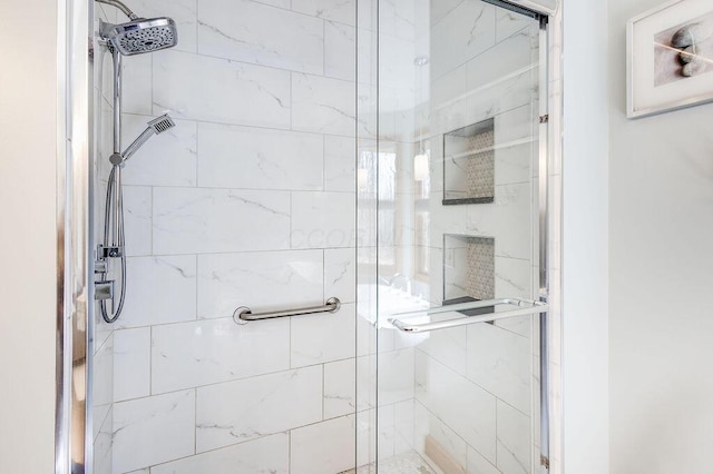 bathroom featuring an enclosed shower