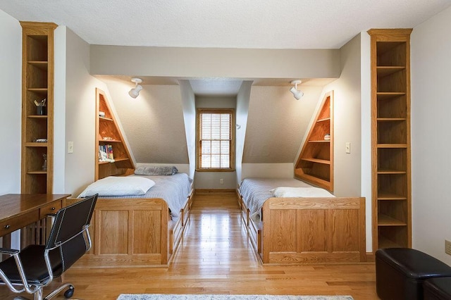 bedroom featuring light hardwood / wood-style floors