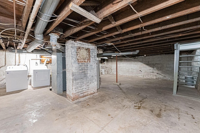 basement featuring separate washer and dryer