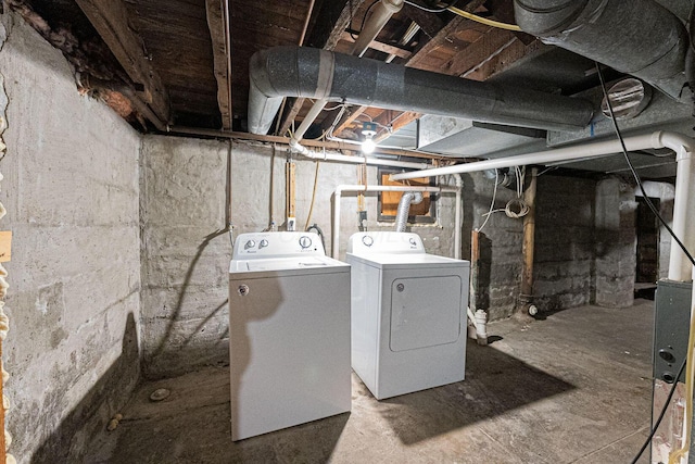 basement with separate washer and dryer