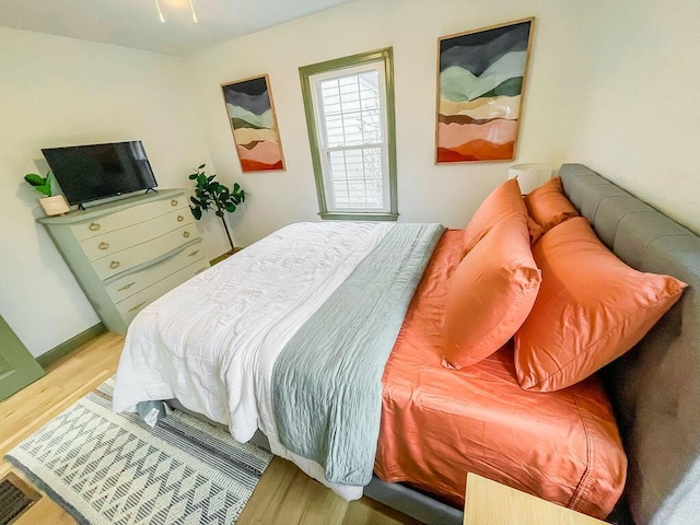 bedroom featuring light hardwood / wood-style flooring