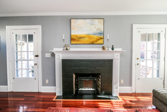 details featuring ornamental molding and wood-type flooring