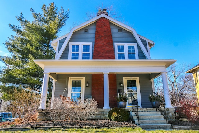 view of front of home featuring covered porch