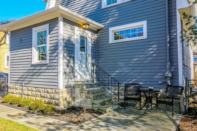 doorway to property featuring a patio