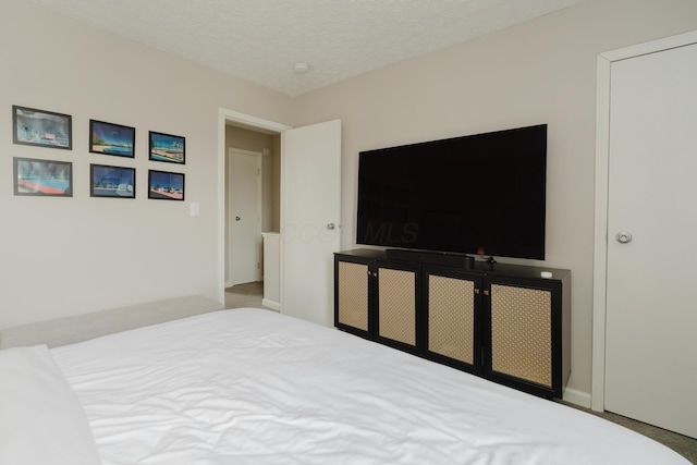 bedroom with a textured ceiling